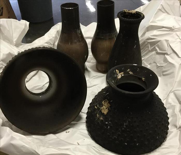 soot damage, ceramic items, black soot